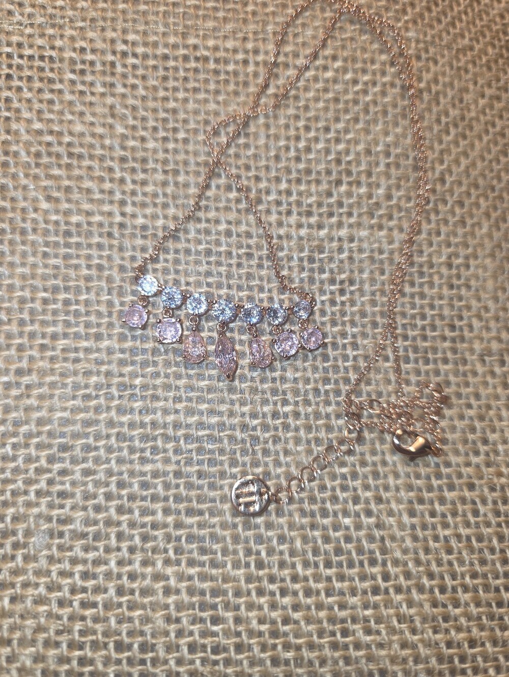 Bomb Party rose gold plated fringe bar necklace featuring light pink CZ